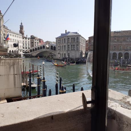 The Regata Storica as seen from Canal Grande apartment's dining room