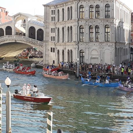 The Regata Storica as seen from Canal Grande apartment's dining room